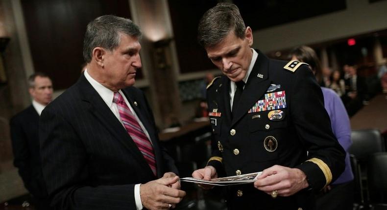 US General Joe Votel (R) said somewhere between four and 12 civilians were killed in a special forces raid against Al Qaeda in Yemen in January