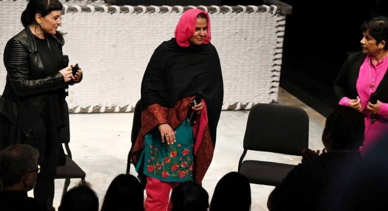 Pakistani human rights activist Mukhtar Mai (C) receives a standing ovation as she takes the stage following performance of the opera 'Thumbprint', at the Roy and Edna Disney/Calarts Theater (REDCAT) in Los Angeles, on June 16, 2017