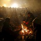 Migrants wait to cross the Slovenia-Austria border in Sentilj