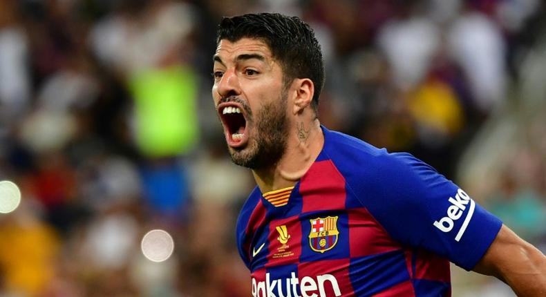 Luis Suarez says Barcelona players took time to reach a pay cut agreement because they were looking for the 'best solution'