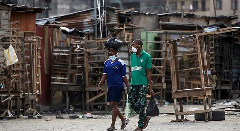 Lagos markets shut after the Federal Government announced a lockdown in three states (Aljazeerah)