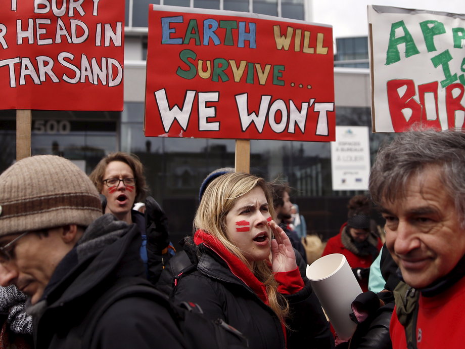 People protest against climate change during a demonstration in Quebec City April 11, 2015.