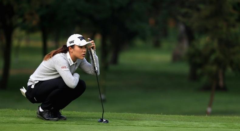 Lydia Ko of New Zealand lines up a putt on the second hole during the first round of the Lorena Ochoa Match Play in Mexico City