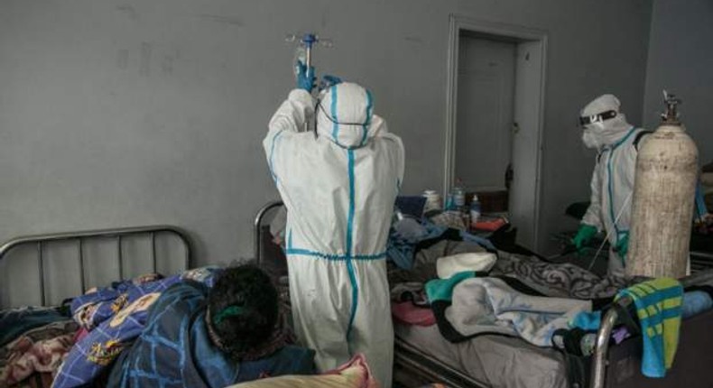 Health workers at the Andohatapenaka University Hospital in Antananarivo treating Covid-19 patients (AFP)