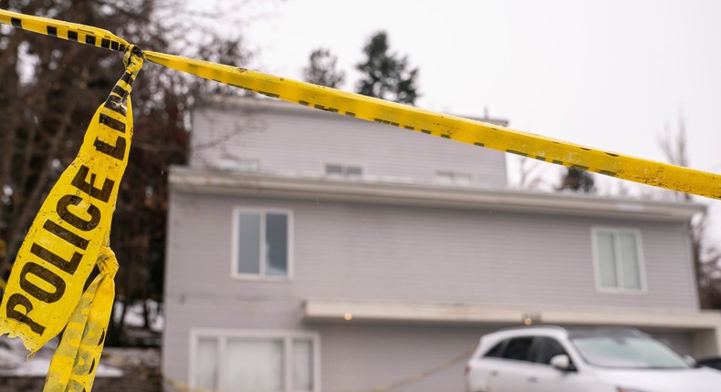 Police tape is seen at the Moscow, Idaho, home that is the site of the November 13 killings of four University of Idaho students.David Ryder/Getty Images