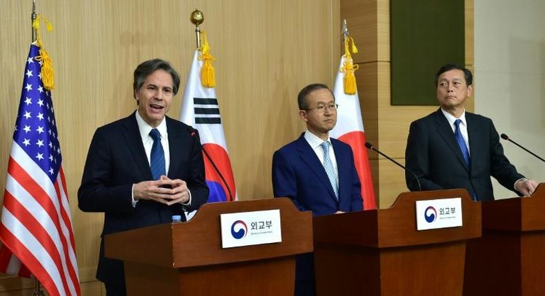 US Deputy Secretary of State Tony Blinken (L) told his South Korean and Japanese counterparts that the US policy regarding North Korea had not changed at a trilateral meeting in Tokyo