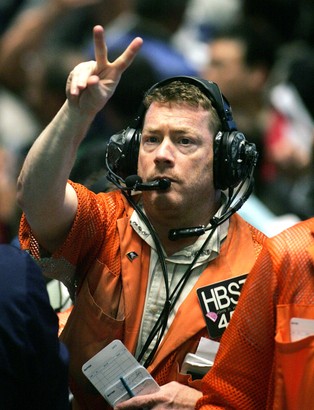 Odreagowanie na giełdach wsparło eurodolara