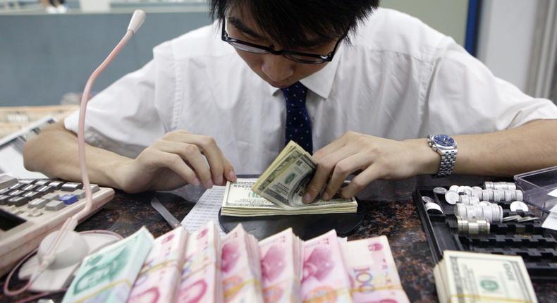 The Chinese yuan's share in international transactions is increasing.China Photos/Getty Images