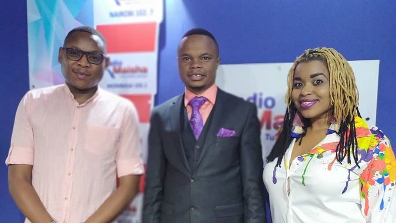 File image of Peter Mureithi Wangai(middle in a suit), the Founder and CEO of Goldenscape with employees of Standard Media Group on 19 August 2019