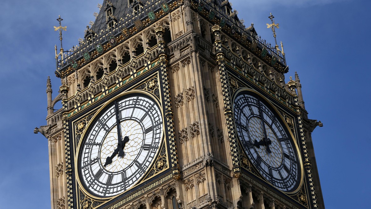 The Elizabeth Tower, which houses the Great Clock and the 'Big Ben' bell, is seen above the Houses o