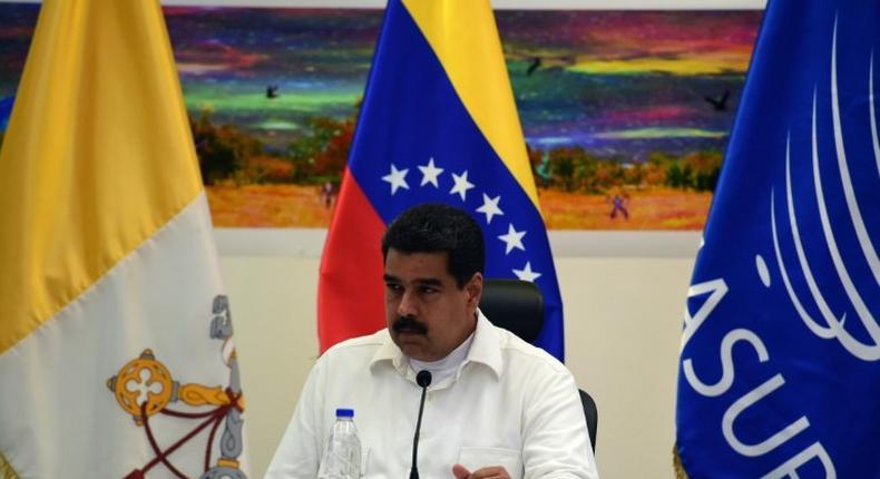 Venezuela's President Nicolas Maduro is pictured during a meeting between Venezuela's government and opposition leaders for Vatican-backed talks, in a bid to settle the country's deepening political crisis, in Caracas on October 30, 2016