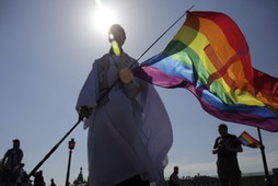 People attend the LGBT (lesbian, gay, bisexual, and transgender) community rally VIII St.Petersburg