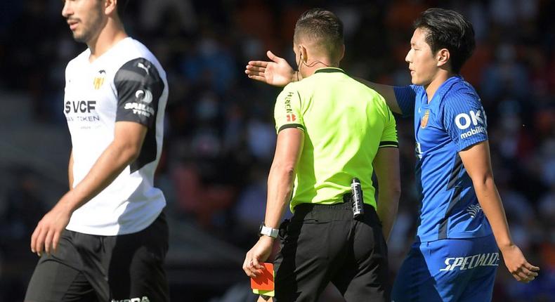 Mallorca's Lee Kang-in (R) was sent off against his former club Valencia on Saturday Creator: Jose Jordan