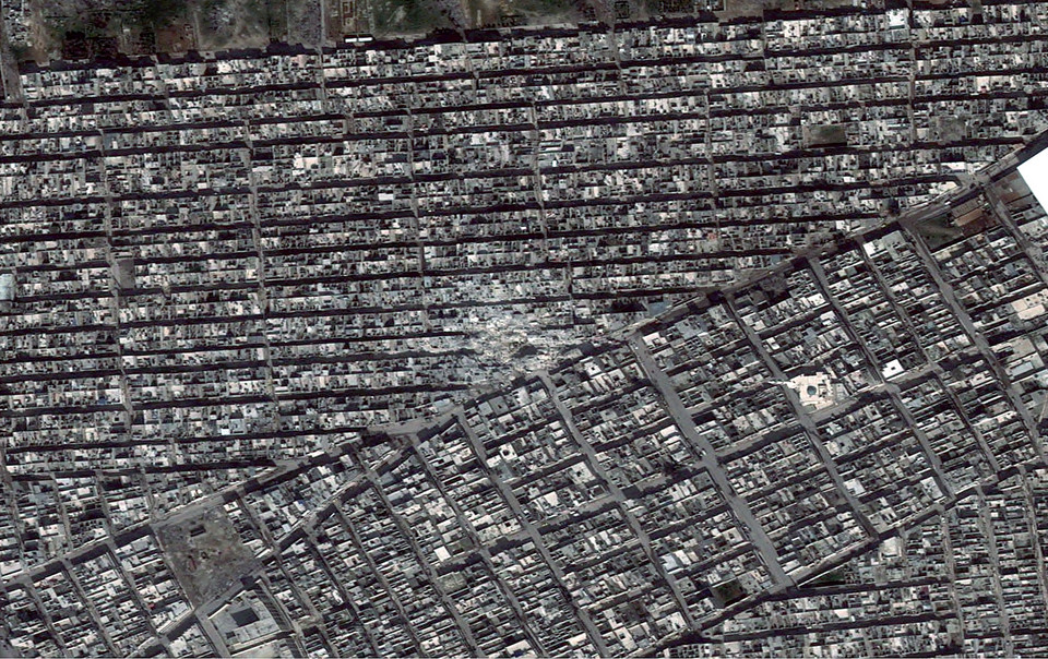 Dzielnica Ard al-Hamra po ostrzale rakietowym 22 lutego 2013 r.