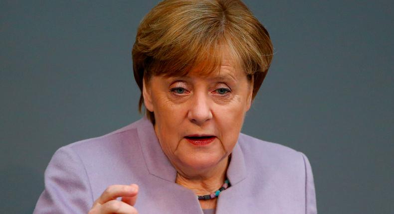 German Chancellor Angela Merkel addresses German Parliament.