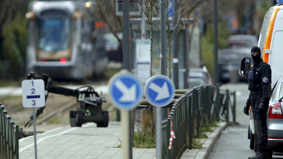 Police use a robotic device as they take part in a search in the Brussels borough of Schaerbeek following Tuesday's bombings in Brussels.