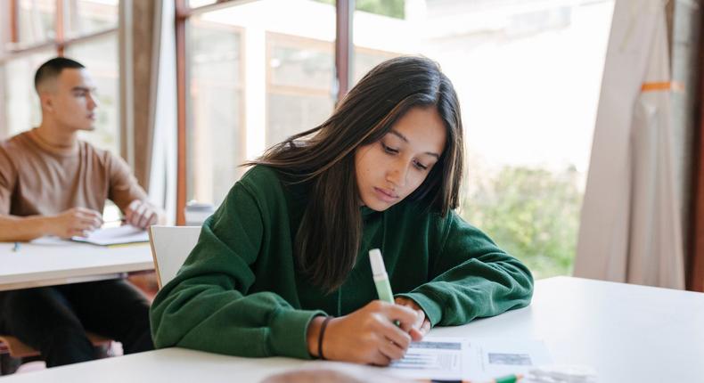 The author is a high school teacher and encourages her students to write by hand.Willie B. Thomas/Getty Images