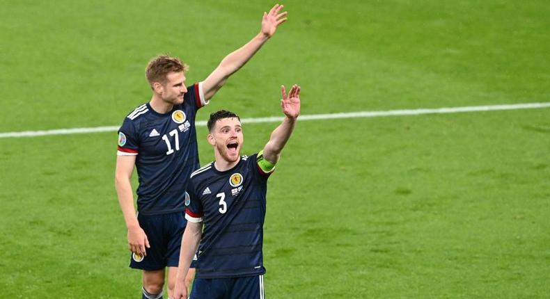 High fives: Scotland earned a 0-0 draw away to England to keep their Euro 2020 hopes alive Creator: FACUNDO ARRIZABALAGA