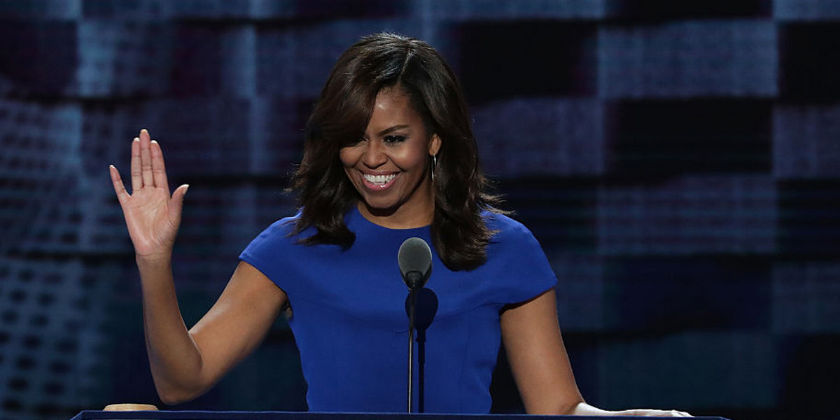 First lady Michelle Obama acknowledges the crowd after delivering remarks on the first day of the Democratic National Convention.