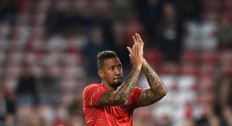 Bayern Munich's defender Jerome Boateng gestures prior the UEFA Champions League match against Eindhoven in Eindhoven on November 1, 2016