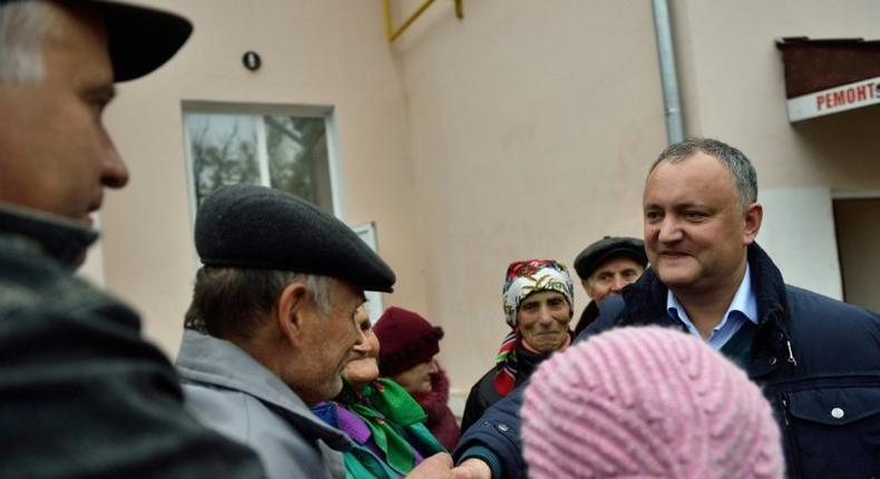 Moldovan Socialist Party presidential candidate Igor Dodon (R) has vehemently advocated against turning toward Europe