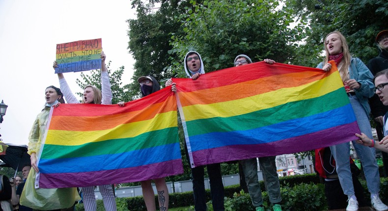 LGBT activists wave their flags during a rally in Moscow, Russia in July 2020.File/AP.