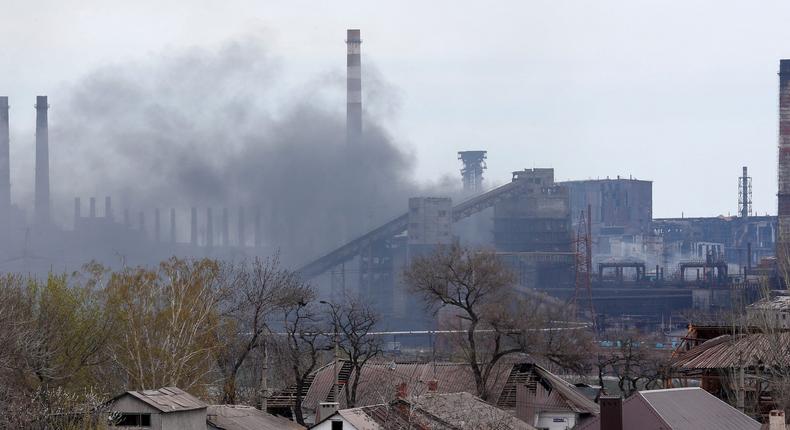 Smoke rises above a plant of Azovstal Iron and Steel Works during Ukraine-Russia conflict in the southern port city of Mariupol, Ukraine April 21, 2022.