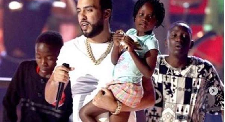 French Montana with The Dancing Ghetto Kids. American Rapper French Montana gifts Uganda Ghetto Kids with multi-million Mansion