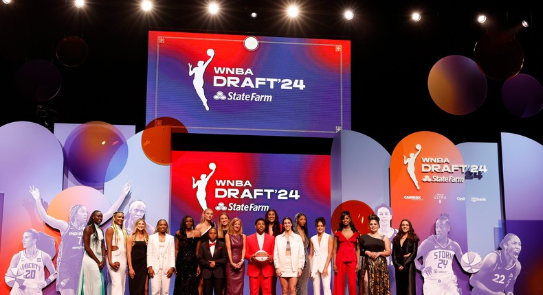 WNBA Commissioner Cathy Engelbert poses with future draftees before the 2024 WNBA Draft.Sarah Stier/Staff/Getty Images