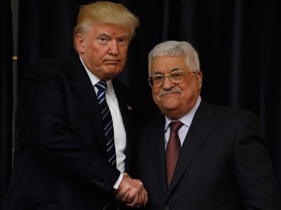 U.S. President Donald Trump and Palestinian President Mahmoud Abbas shake hands as they conclude their remarks after their meeting at the Presidential Palace in the West Bank city of Bethlehem May 23, 2017.