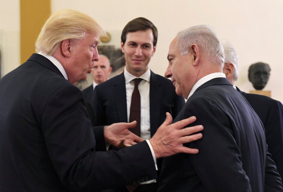 Israel's Prime Minister Benjamin Netanyahu and U.S. President Donald Trump chat as White House senior advisor Jared Kushner is seen in between them, during their meeting at the King David hotel in Jerusalem May 22, 2017.