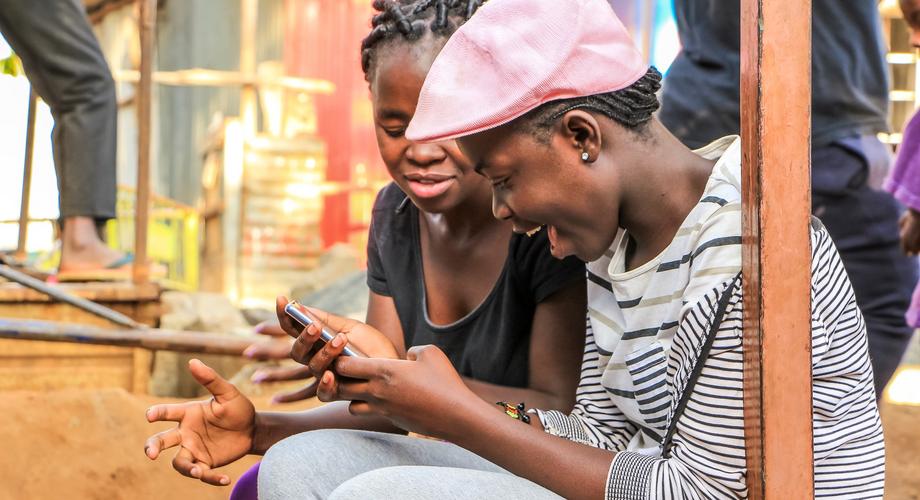 Kenyans using a phone