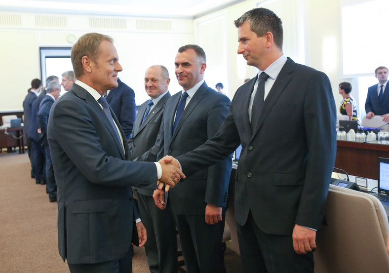 Donald Tusk i Mateusz Szczurek w lipcu 2014 r.