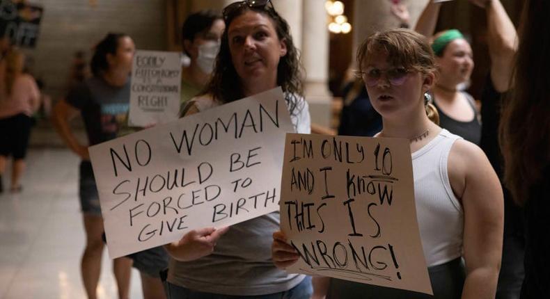 Abortion-rights protesters demonstrate inside the Indiana State house. As the legislature is holding a special session to consider curtailing abortion rights in the wake of the U.S. Supreme Court ruling overturning Roe v. Wade last month, abortion rights activists protested in Indianapolis.