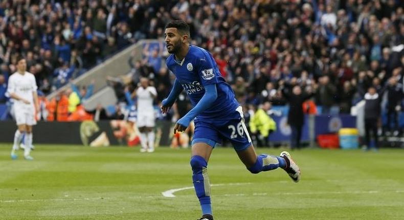 Football Soccer - Leicester City v Swansea City - Barclays Premier League - The King Power Stadium - 24/4/16 Riyad Mahrez celebrates scoring the first goal for Leicester City Action Images via Reuters / Jason Cairnduff Livepic EDITORIAL USE ONLY. No use with unauthorized audio, video, data, fixture lists, club/league logos or live services. Online in-match use limited to 45 images, no video emulation. No use in betting, games or single club/league/player publications. Please contact your account representative for further details.