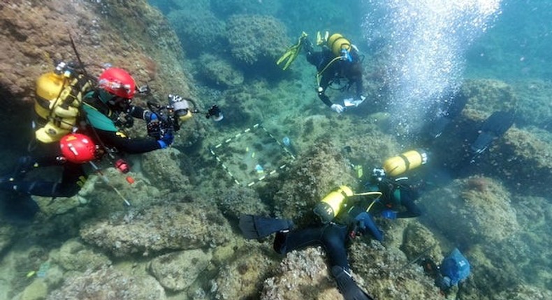 Amateur freedivers found a large collection of gold Roman coins off the coast of Spain.
