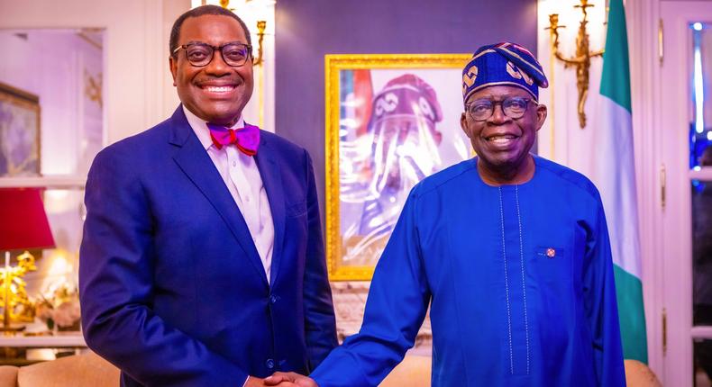President Bola Tinubu (right) shakes hands with the president of the African Development Bank (AfDB), Dr Akinwumi Adesina (left) [Presidency]