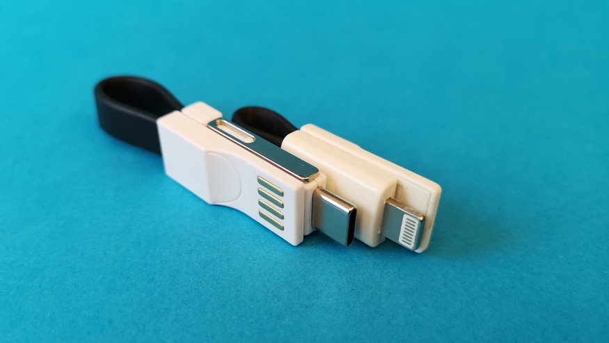 These two charging cables look very similar.  However, the rear model only has one Lightning connector.  The front one also has micro USB and USB-C.