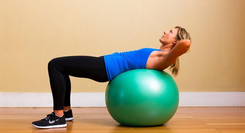 Crunches with exercise ball