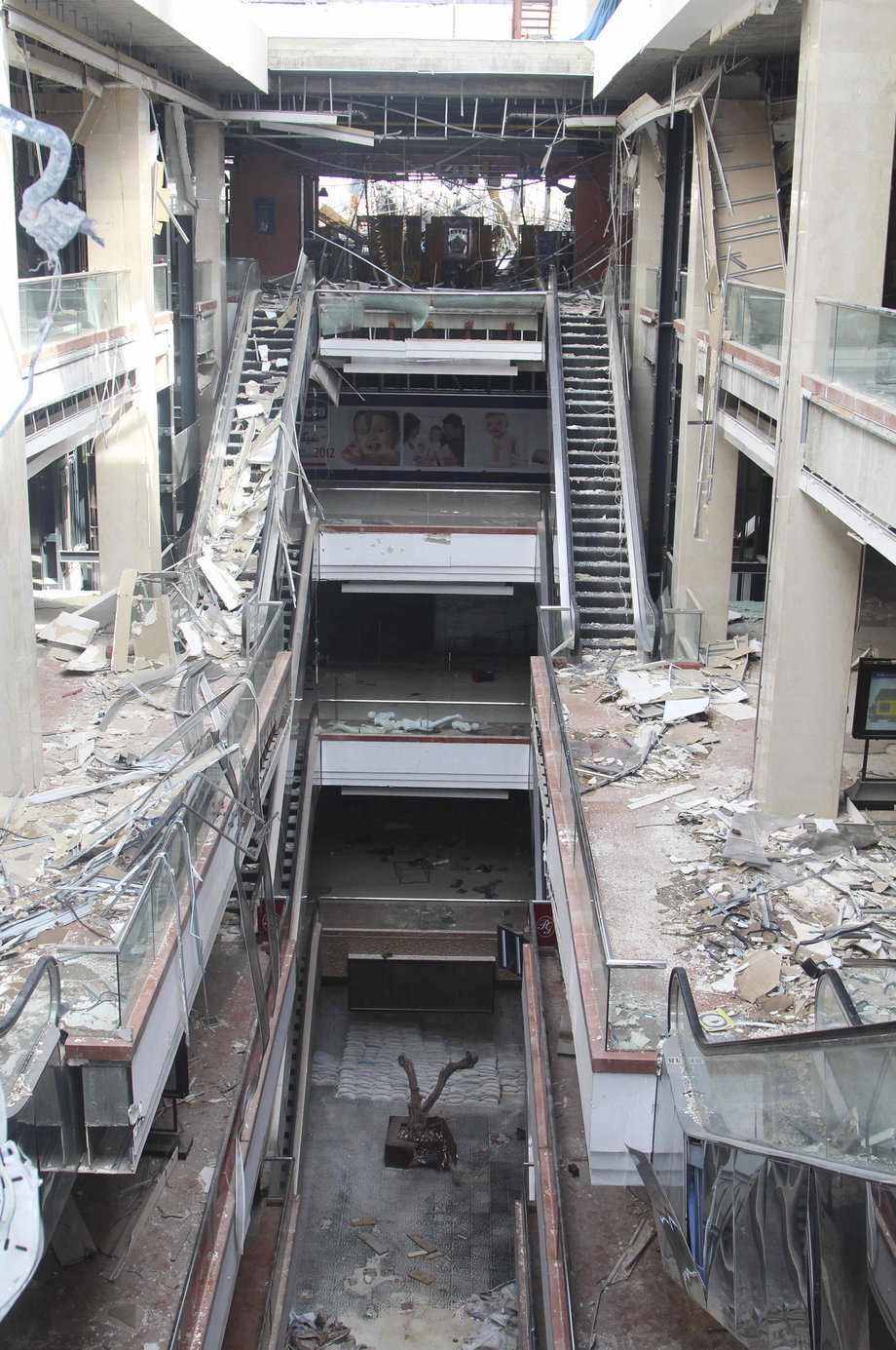 Damage inside Shahba Mall, one of the largest commercial shopping centers in Syria, which was targeted by what activists said were airstrikes by forces loyal to Assad, in 2014.