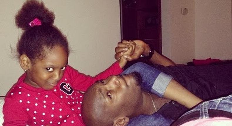 2face and his daughter, Isabella.