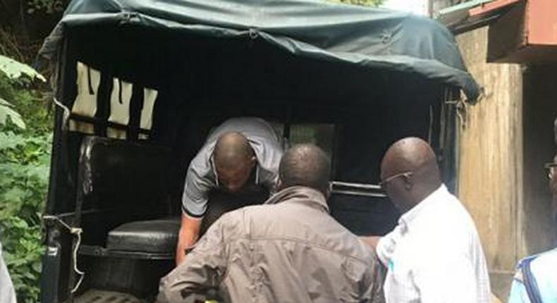 File image of police carrying a body into a police van. A 25 year old lady was beaten to death over her plans to marry the 'wrong guy'
