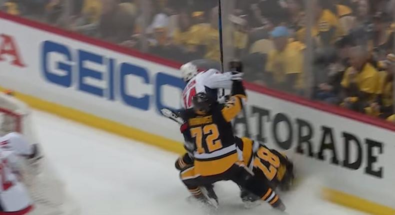 Sidney Crosby crashes head-first into the boards during Game 6 against the Washington Capitals.