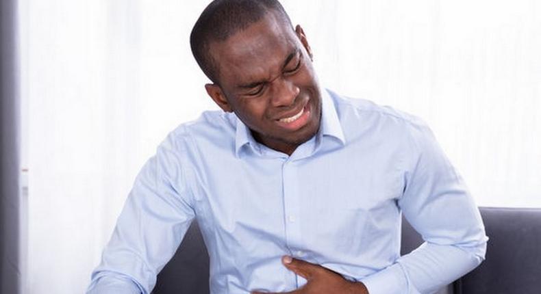 A man suffering from heartburn