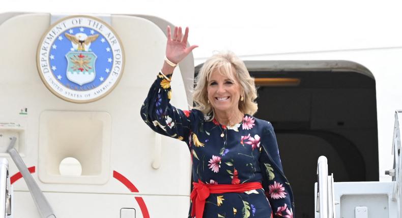 US First Lady Jill Biden waves as she walks off the plane as she arrives in Savannah, Georgia on July 8, 2021.