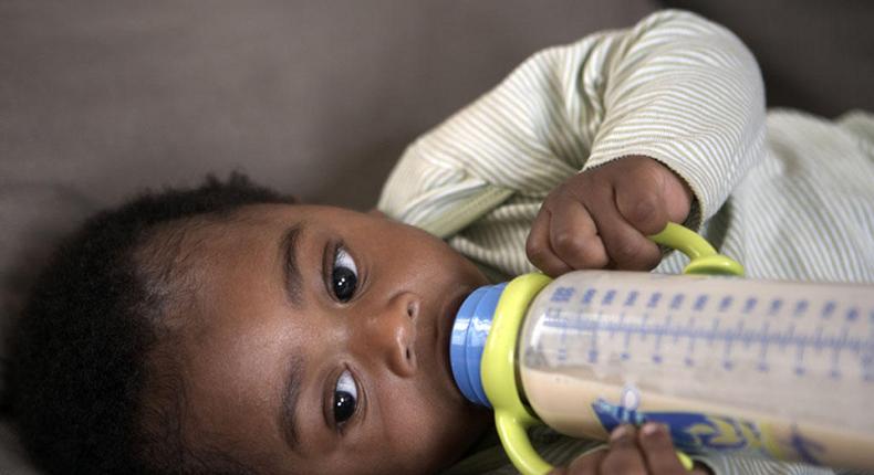 Baby feeding from a bottle