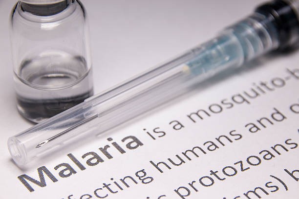 Fighting Malaria: A syringe and vial symbolize the global effort to combat one of Africa’s deadliest diseases