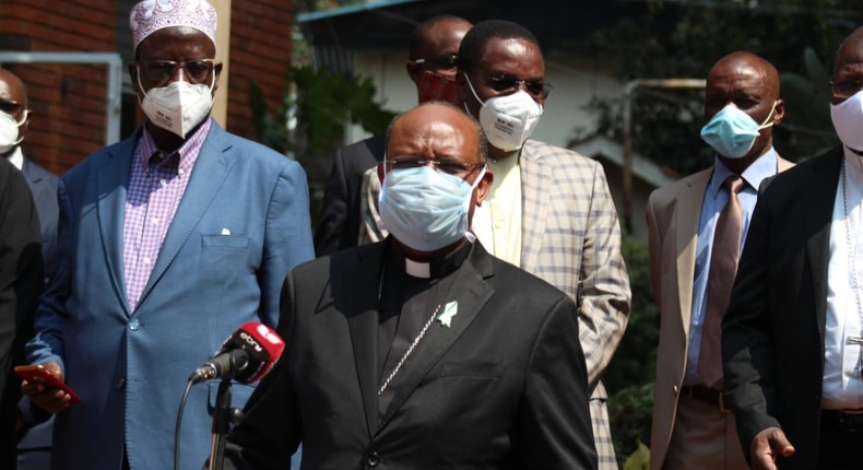 Chairperson of the Interfaith Council Archbishop Anthony Muheria addresses a press conference