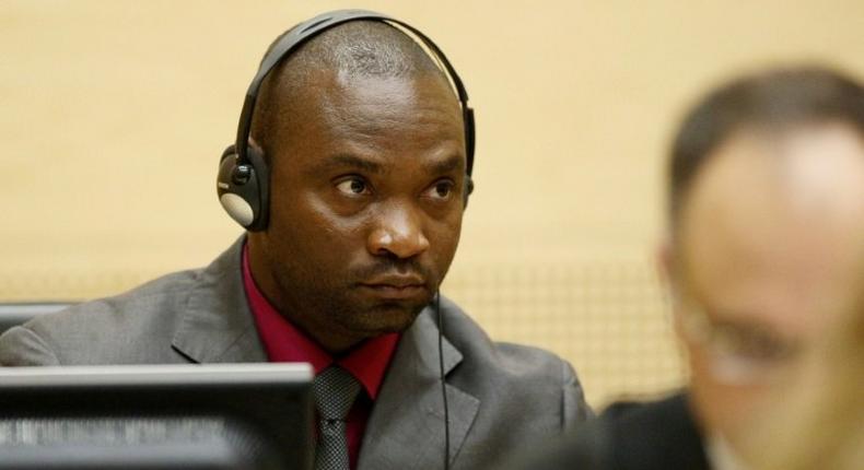 Congolese warlord Germain Katanga (C) was sentenced by the ICC to 12 years in jail in 2014, after being convicted on five charges of war crimes and crimes against humanity