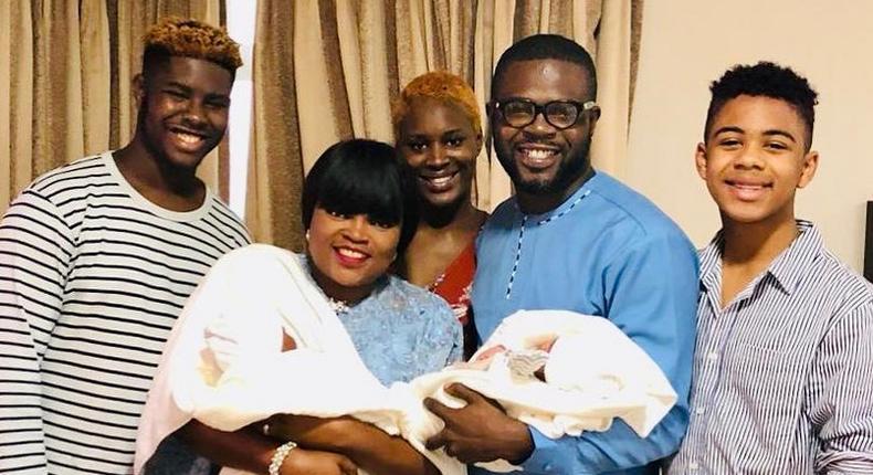 Funke Akindele joins her family, who now include newborn twins, in an intimate picture. - Instagram/funkejenifaakindele